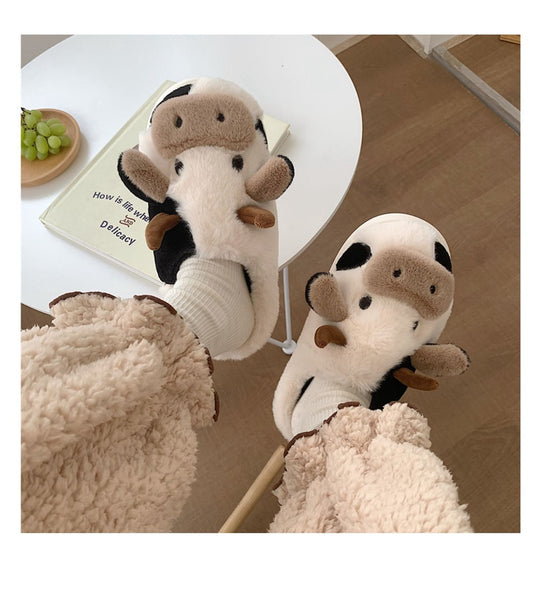 FURRY COW SLIPPERS