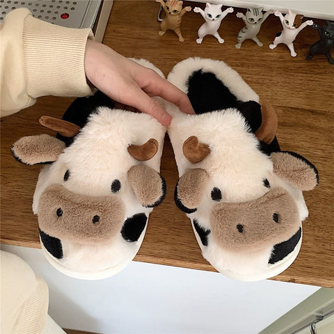 FURRY COW SLIPPERS