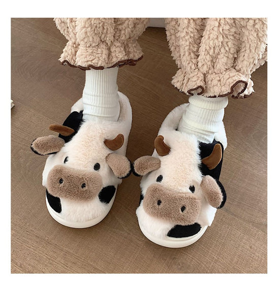 FURRY COW SLIPPERS