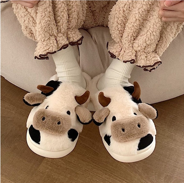 FURRY COW SLIPPERS